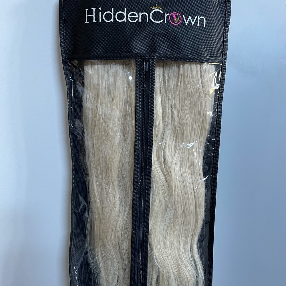 Brand new, never worn. Hidden crown extensions. 20”.